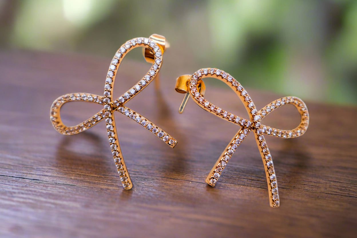 Golden Bow Tie Sparkle Earrings - Elegant Accessory
