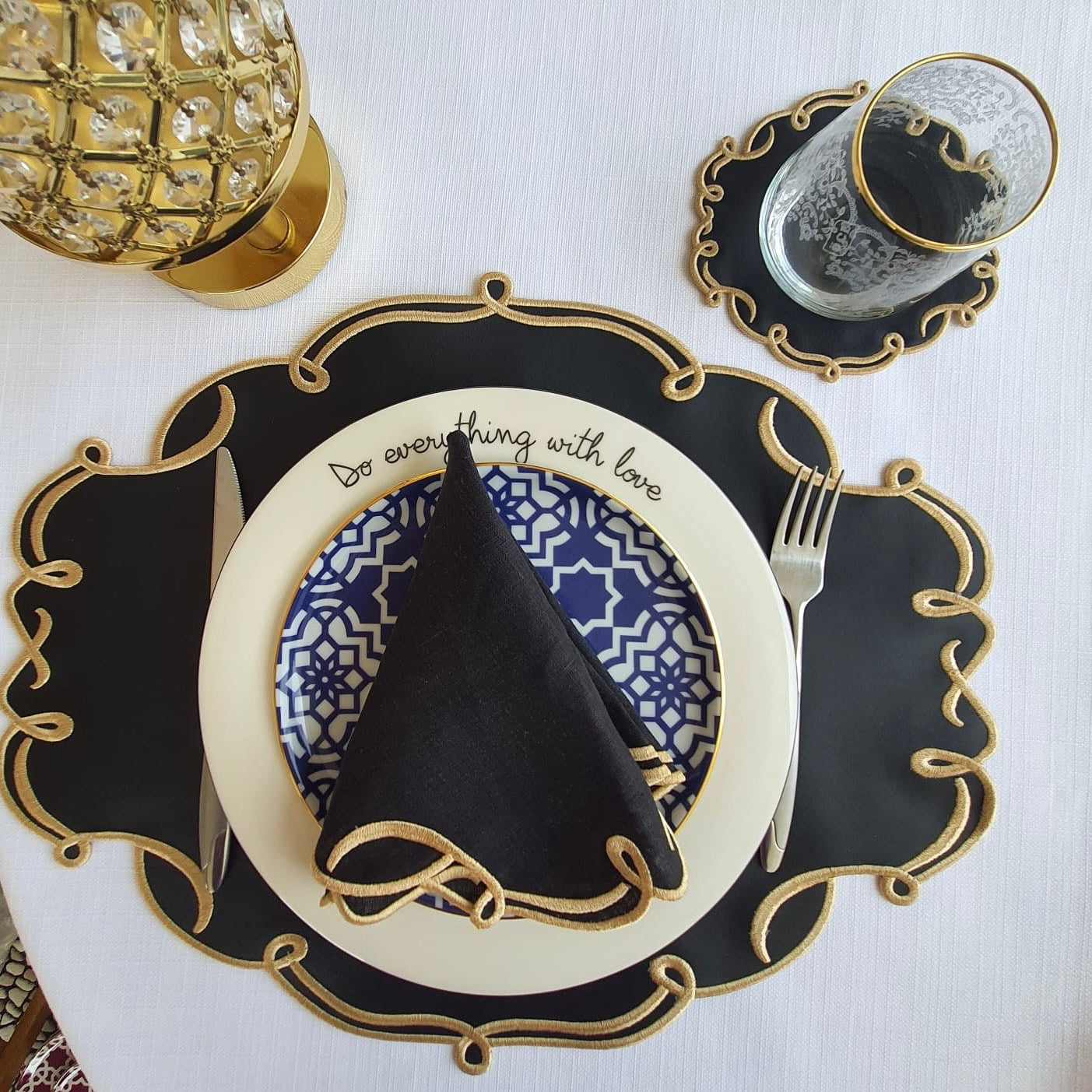 CELESTIA BLACK OVAL FAUX LEATHER PLACEMAT & NAPKIN & COASTER SET