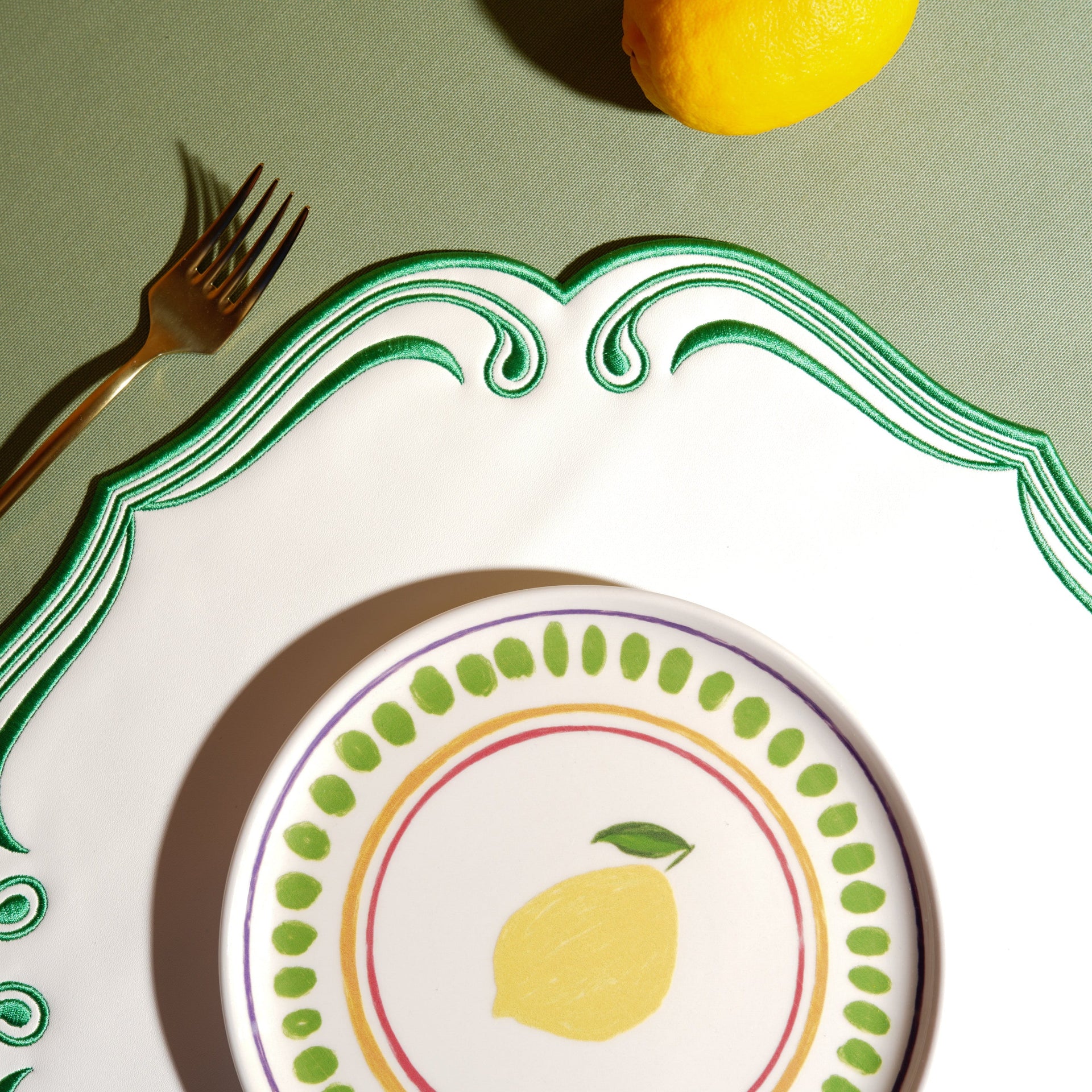 ROYAL WHITE GREEN TRIM SQUARE FAUX LEATHER PLACEMAT