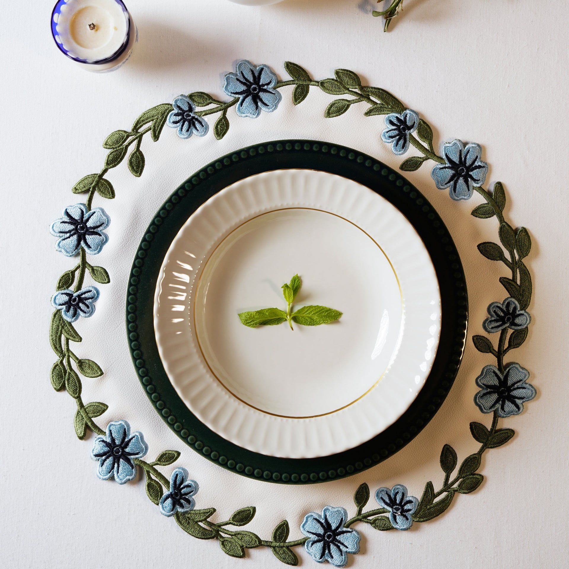 UNITY WHITE & BLUE ROUND FAUX LEATHER PLACEMAT