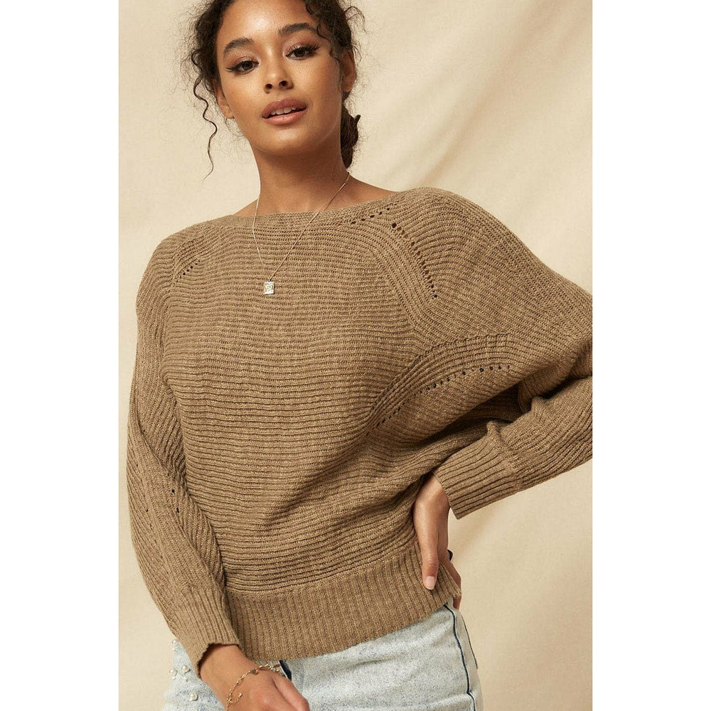 Un pull en maille côtelée